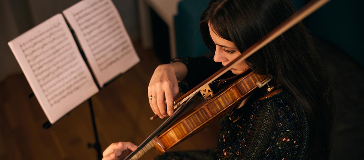 Woman practising the violin