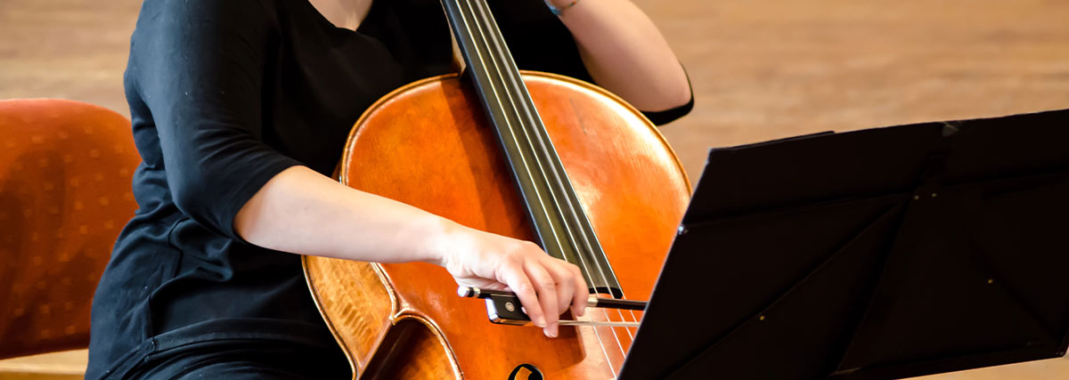 Woman practising the cello