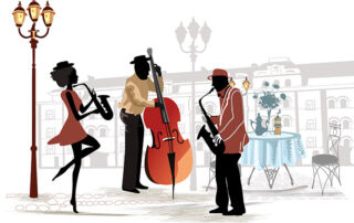 Two men and a woman playing music in the street