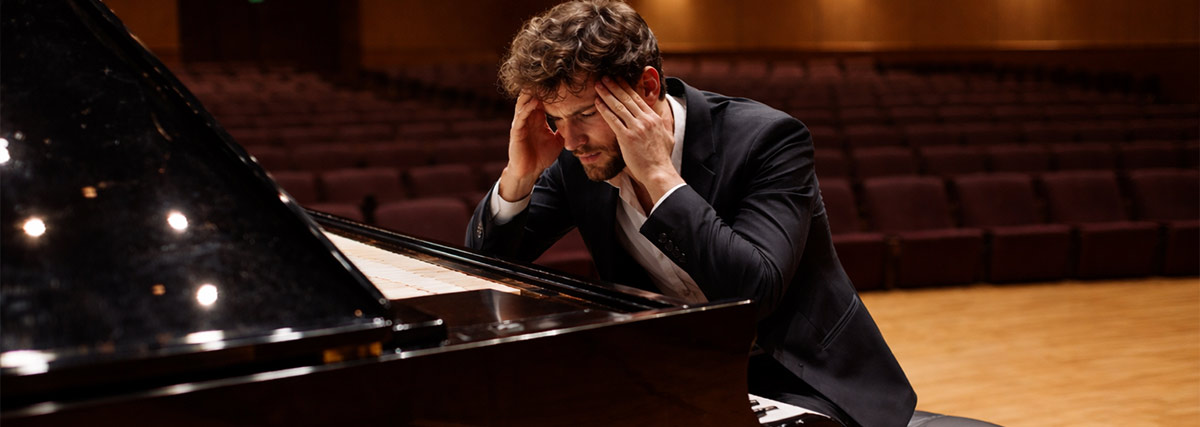 Stressed pianist on stage
