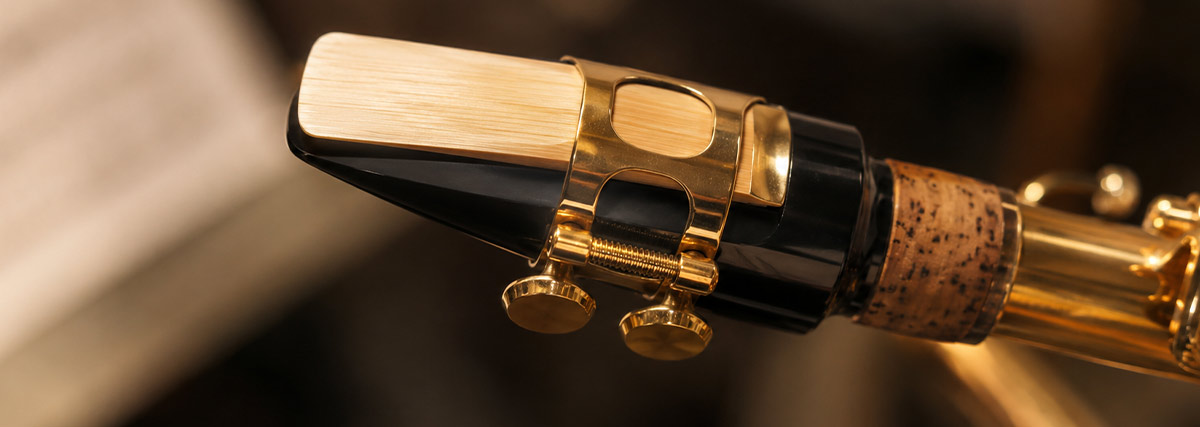 Close-up of a saxophone reed and mouthpiece for learning the saxophone.